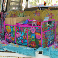 car trunk organizer shown in car with groceries