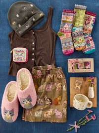 Flatlay of various cat themed items
