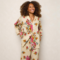 girl in cream colored floral pajama set