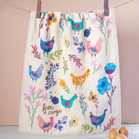 kitchen towel with chickens on it that says free range
